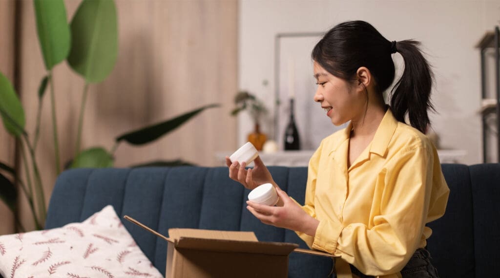 Woman opening healthcare package